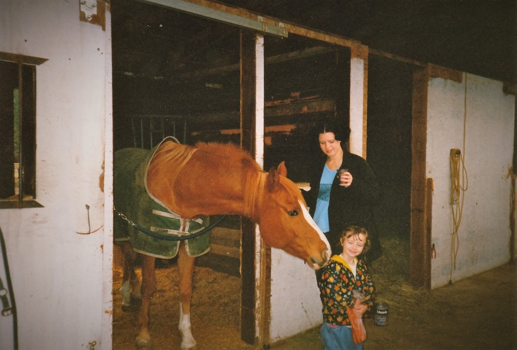 Kid sister with the horse