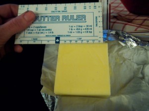 Measuring out the butter for cheese free mac 'n' cheese