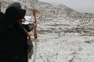 Archery target practice in the snow
