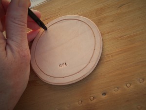 The base of the custom leather tooled quiver