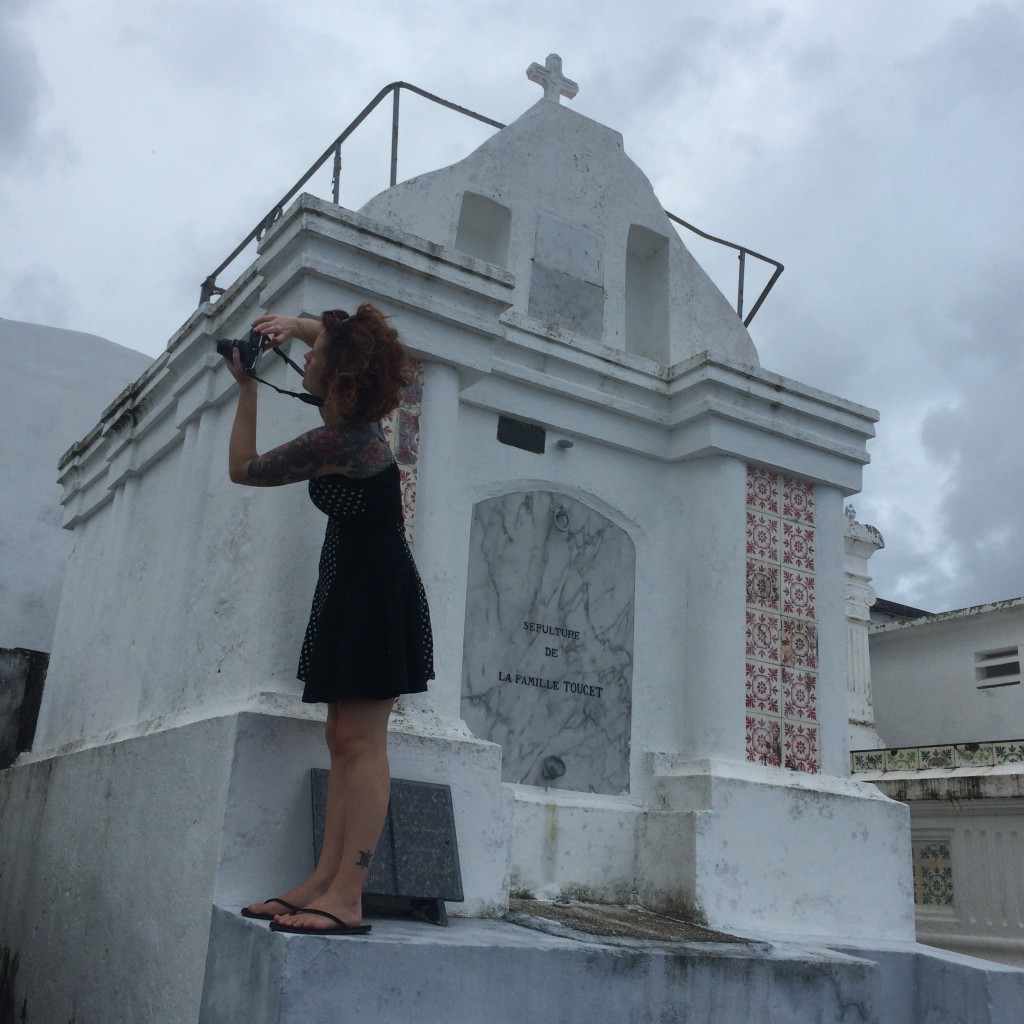 Photographing tombs in the cemetery in Sainte-Rose Guadeloupe
