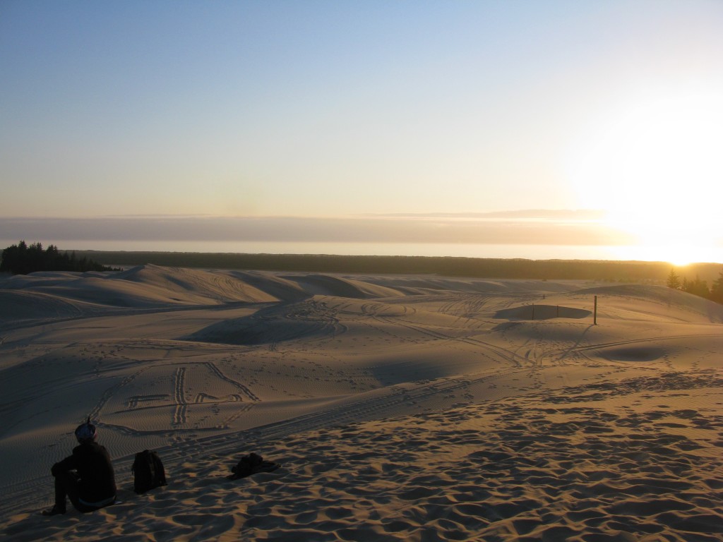 Watching the sunset from the sand dunes on the Oregon Coast