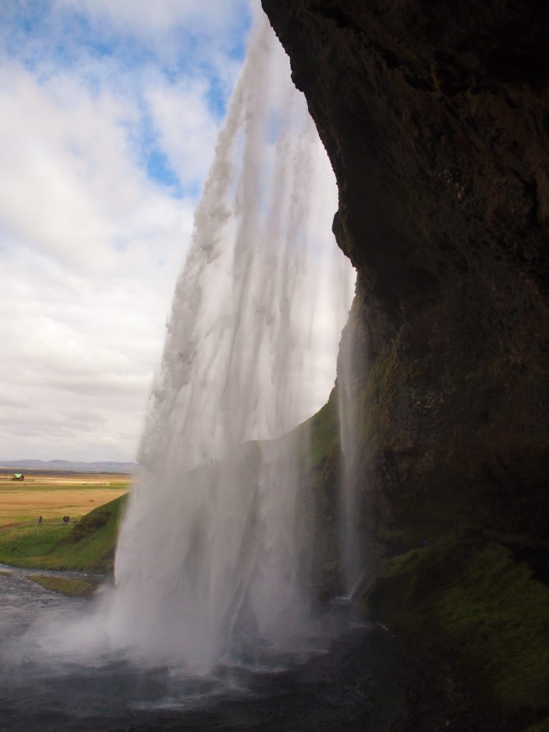 Behind the waterfall Seljalandsfoss in south Iceland on my road trip