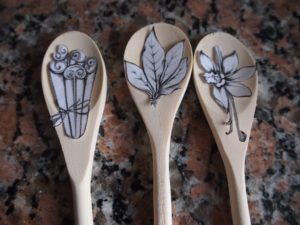 Preparing the art to wood burn on wooden spoons for mothers day